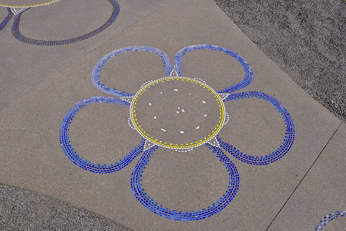 Flower design integrated into Sandscape® concrete.